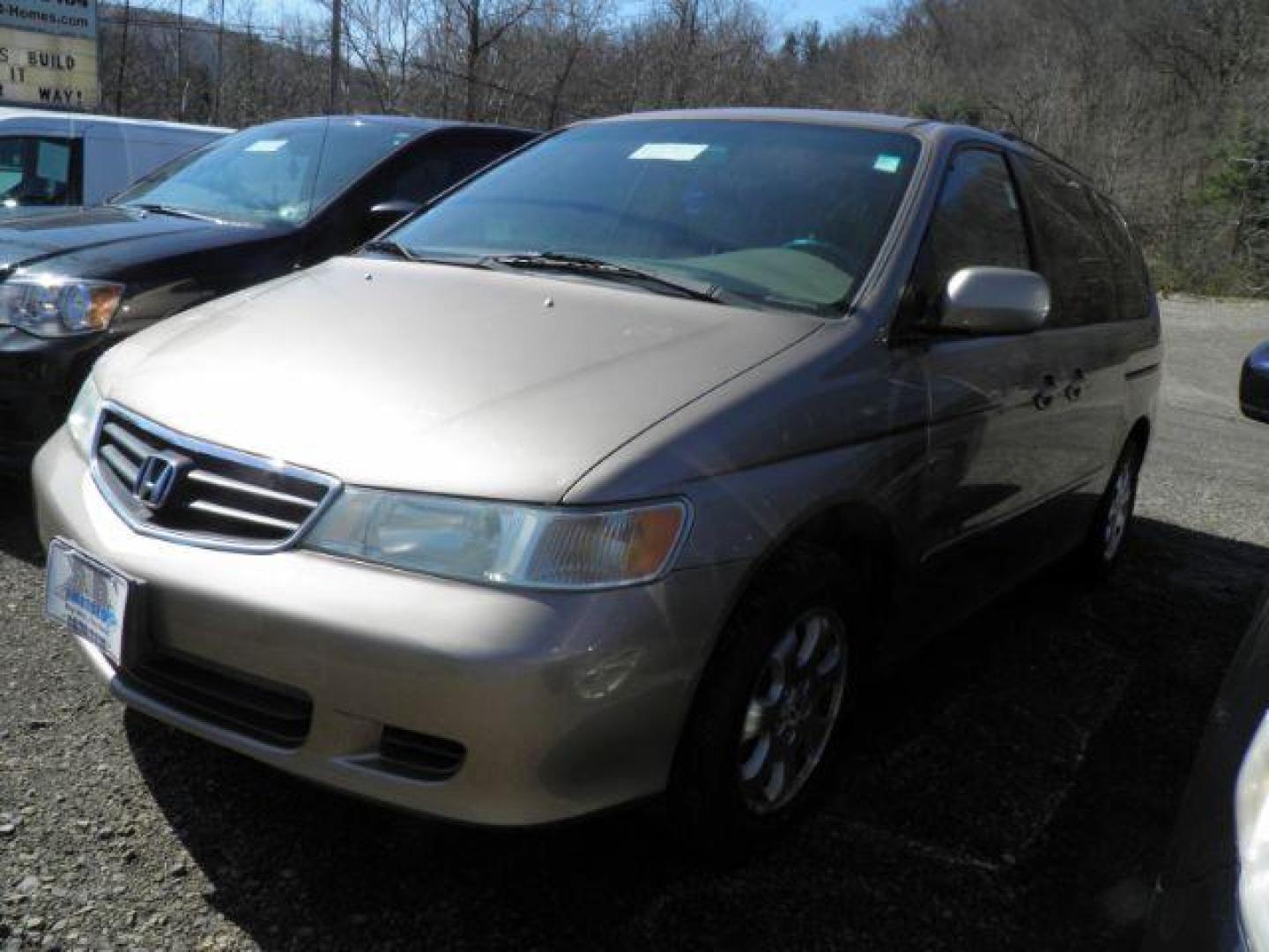 2004 TAN Honda Odyssey EX w/ Leather and Navigation (5FNRL18794B) with an 3.5L V6 engine, AT transmission, located at 19521 New George's Creek Rd SW, Barton, MD, 21521, (301) 463-2404, 39.524323, -79.017906 - Photo#0