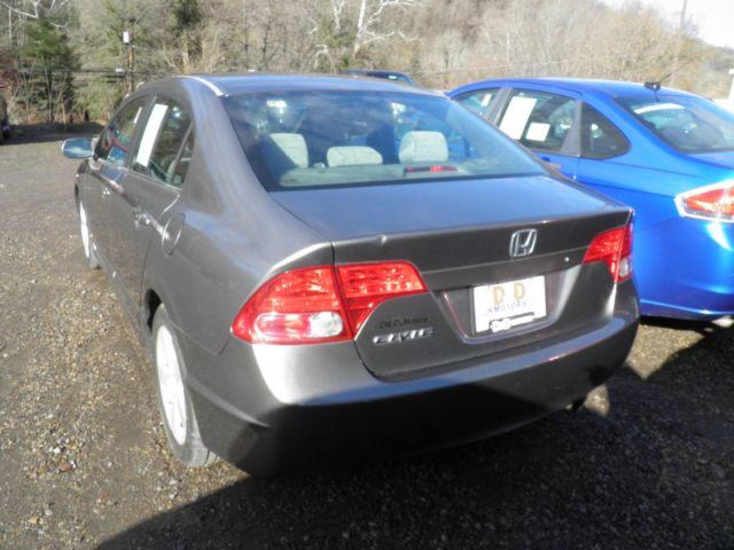 2006 GRAY Honda Civic EX Sedan (1HGFA15876L) with an 1.8L L4 engine, 5SP transmission, located at 19521 New George's Creek Rd SW, Barton, MD, 21521, (301) 463-2404, 39.524323, -79.017906 - Photo#4