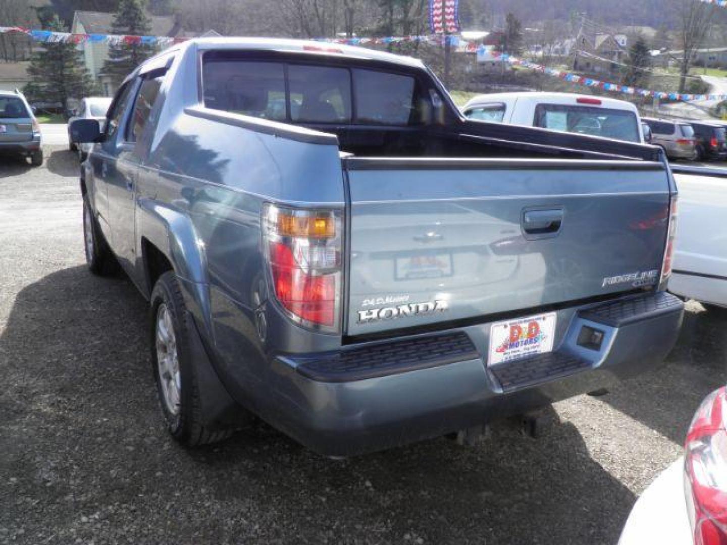 2006 BLUE Honda Ridgeline RTS (2HJYK16466H) with an 3.5 V6 engine, AT transmission, located at 19521 New George's Creek Rd SW, Barton, MD, 21521, (301) 463-2404, 39.524323, -79.017906 - Photo#4