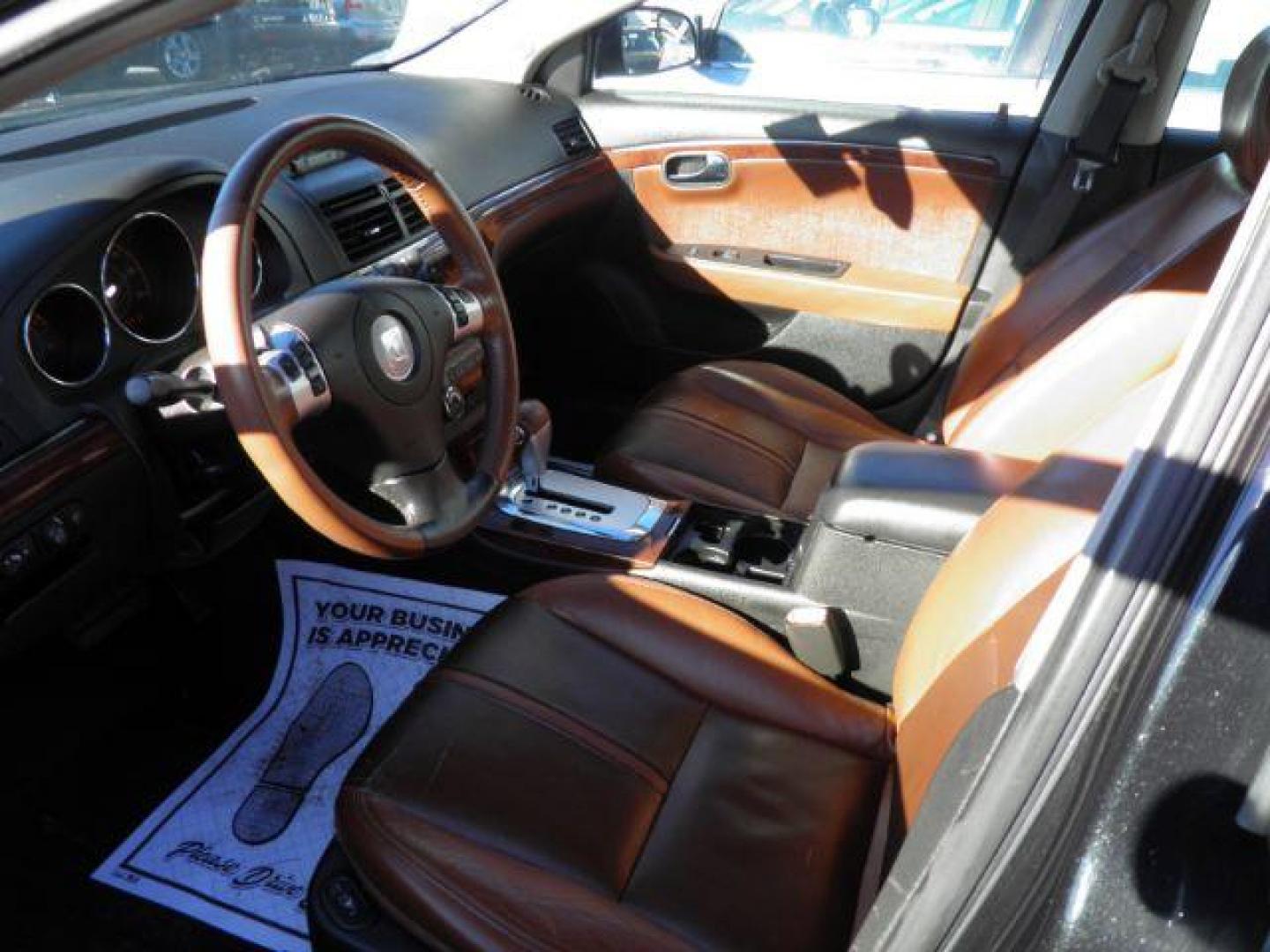 2008 BLACK Saturn Aura XR (1G8ZV57718F) with an 3.6L V6 engine, AT transmission, located at 15520 McMullen Hwy SW, Belair, MD, 21502, (301) 729-3700, 39.581375, -78.846451 - Photo#1