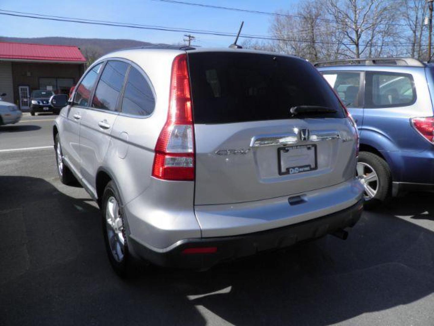 2009 SILVER Honda CR-V EX-L 4WD 5-Speed AT (5J6RE48779L) with an 2.4L L4 engine, AT transmission, located at 15520 McMullen Hwy SW, Belair, MD, 21502, (301) 729-3700, 39.581375, -78.846451 - Photo#5