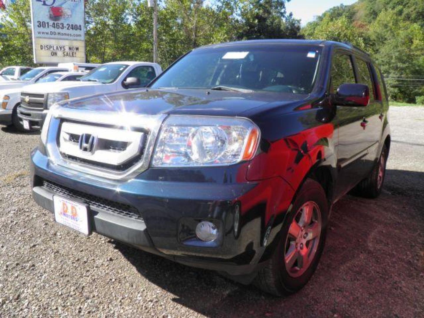 2009 Blue Honda Pilot EX-L 4WD (5FNYF48589B) with an 3.5L V6 engine, AT transmission, located at 19521 New George's Creek Rd SW, Barton, MD, 21521, (301) 463-2404, 39.524323, -79.017906 - Photo#0