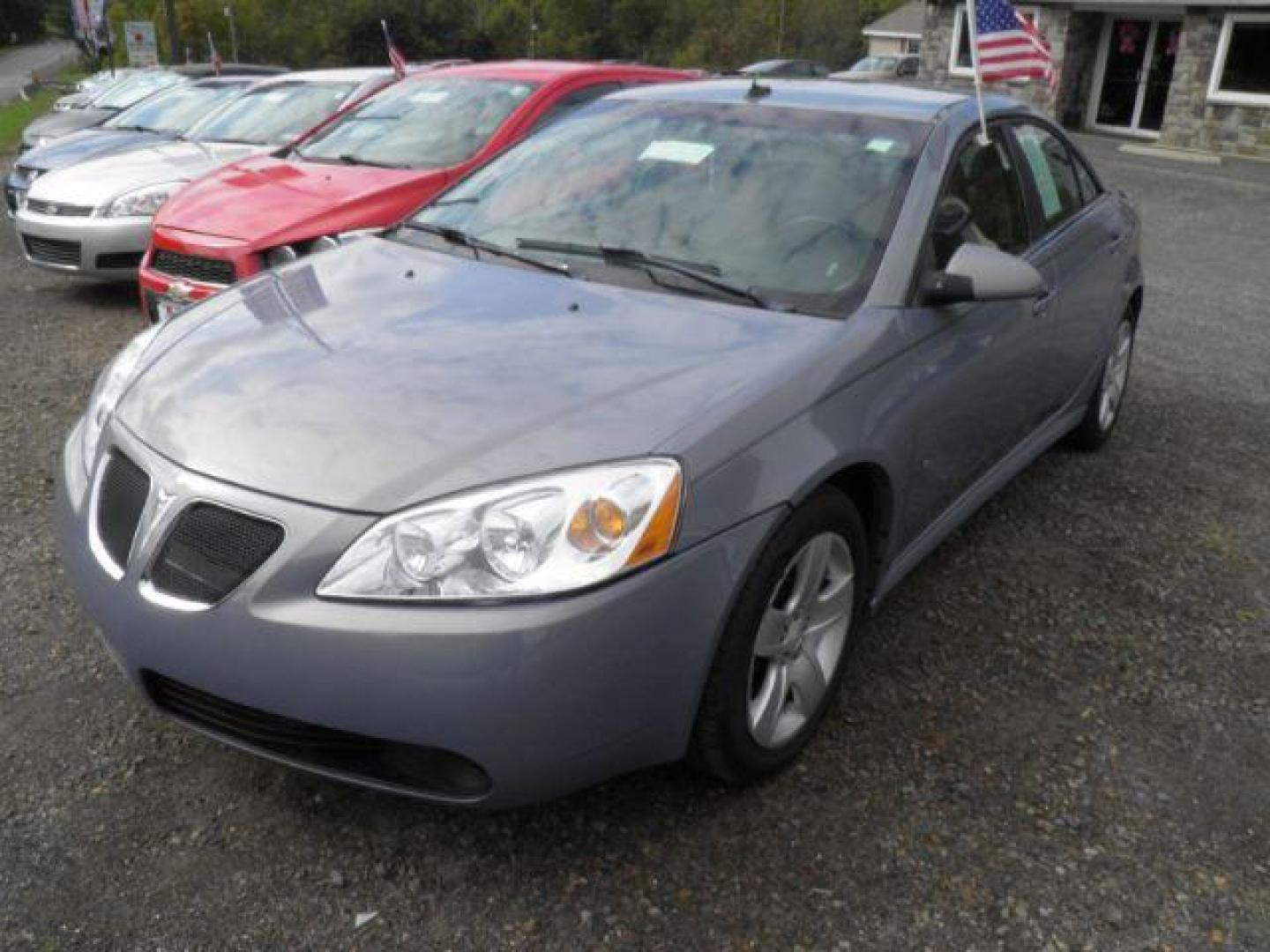 2009 BLUE Pontiac G6 Sedan (1G2ZJ57B594) with an 2.4l L4 engine, AT transmission, located at 19521 New George's Creek Rd SW, Barton, MD, 21521, (301) 463-2404, 39.524323, -79.017906 - Photo#0