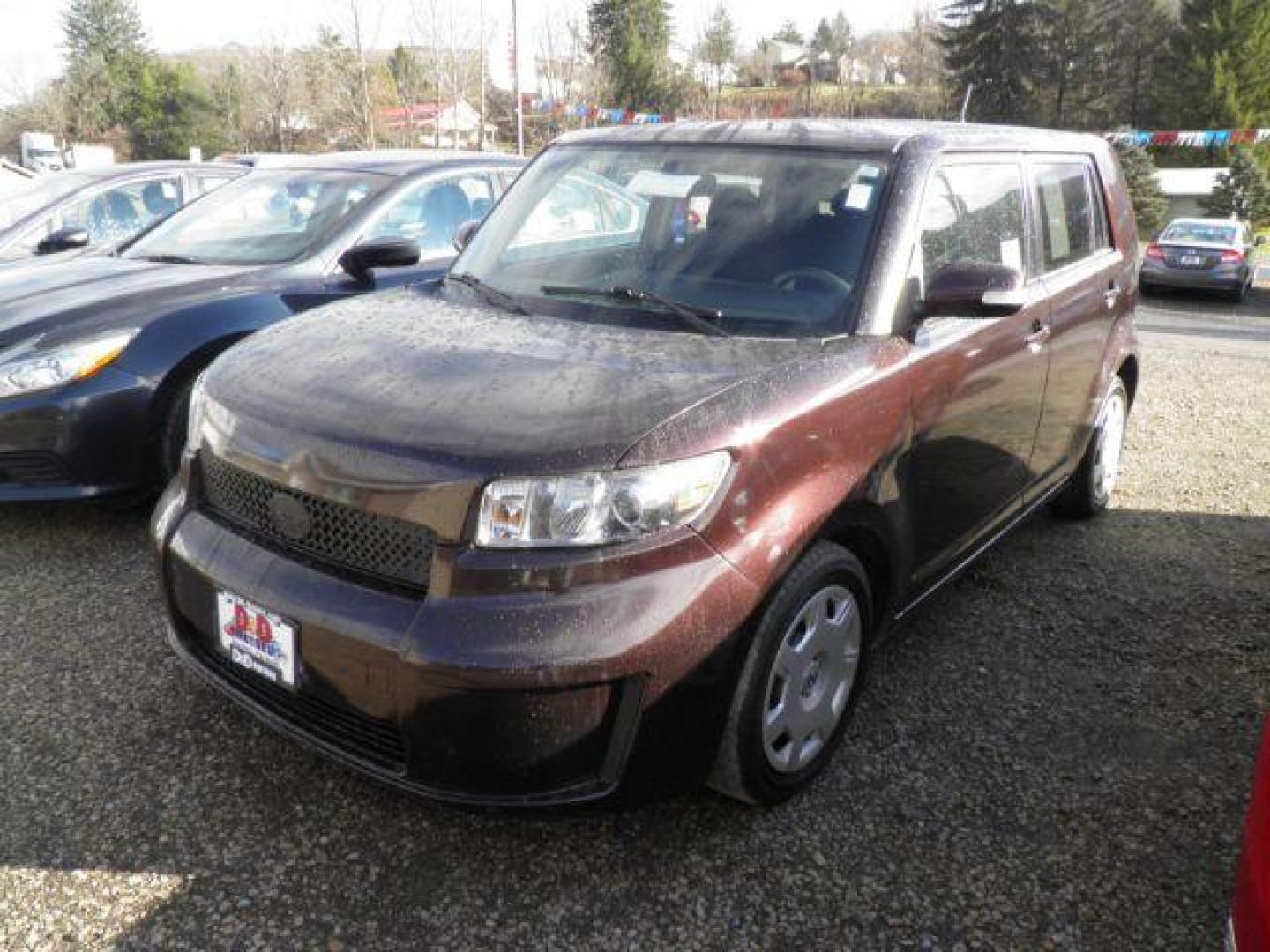 2009 Purple Scion xB Wagon (JTLKE50E091) with an 2.4/cly engine, 5SP transmission, located at 19521 New George's Creek Rd SW, Barton, MD, 21521, (301) 463-2404, 39.524323, -79.017906 - Photo#0