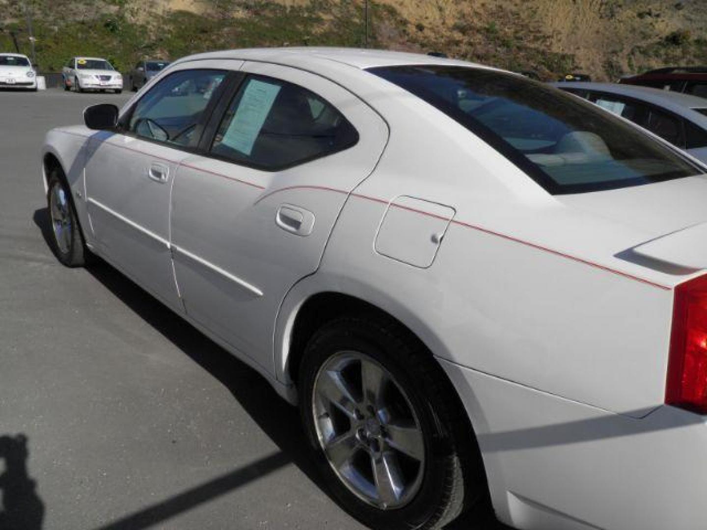 2010 WHITE DODGE CHARGER SXT (2B3CA3CV1AH) with an 3.5L V6 SOHC 24V engine, AT transmission, located at 15520 McMullen Hwy SW, Belair, MD, 21502, (301) 729-3700, 39.581375, -78.846451 - Photo#4