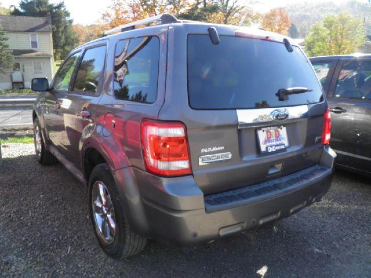 2010 GRAY Ford Escape Limited 4WD (1FMCU9EG6AK) with an 3.0 V6 engine, AT transmission, located at 19521 New George's Creek Rd SW, Barton, MD, 21521, (301) 463-2404, 39.524323, -79.017906 - Photo#5