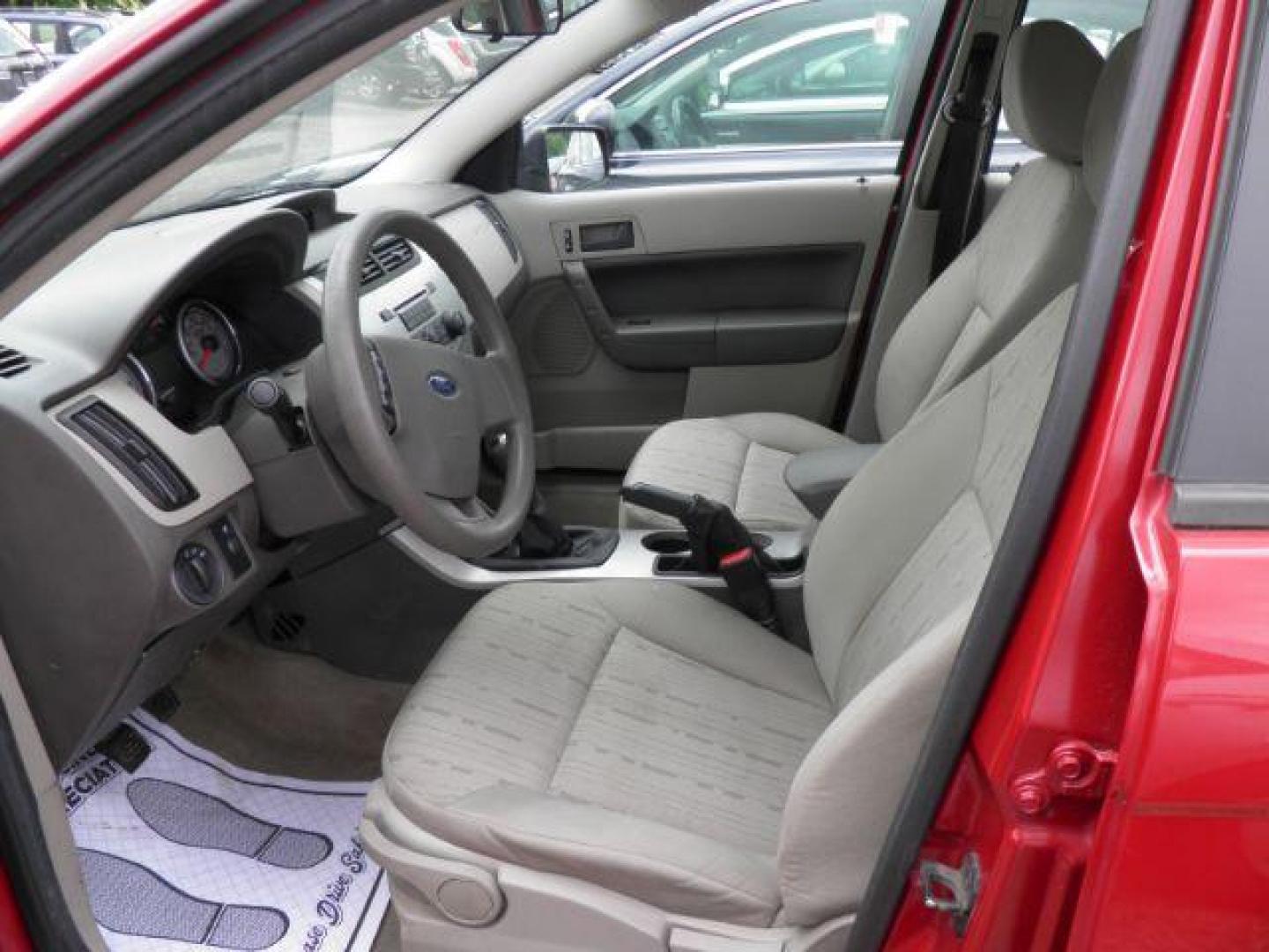 2010 RED Ford Focus SE Sedan (1FAHP3FN2AW) with an 2.0L L4 engine, 5SP transmission, located at 19521 New George's Creek Rd SW, Barton, MD, 21521, (301) 463-2404, 39.524323, -79.017906 - Photo#1