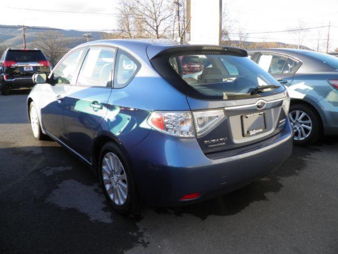 2010 BLUE Subaru Impreza 2.5i Premium 5-Door (JF1GH6B63AH) with an 2.5 L4 engine, AT transmission, located at 15520 McMullen Hwy SW, Belair, MD, 21502, (301) 729-3700, 39.581375, -78.846451 - Photo#5