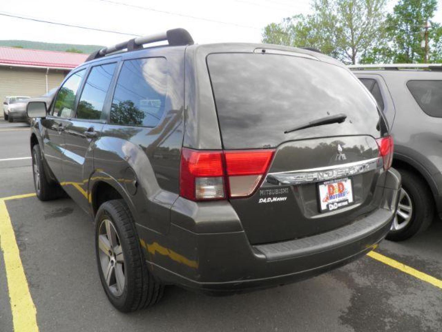 2011 TAN Mitsubishi Endeavor SUV (4A4JN3AS5BE) with an 3.8/6CLY engine, AT transmission, located at 15520 McMullen Hwy SW, Belair, MD, 21502, (301) 729-3700, 39.581375, -78.846451 - Photo#5