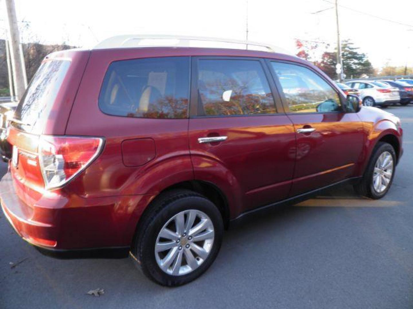 2011 RED SUBARU FORESTER 2.5X Limited (JF2SHAGC3BH) with an 2.5 L4 engine, AT transmission, located at 15520 McMullen Hwy SW, Belair, MD, 21502, (301) 729-3700, 39.581375, -78.846451 - Photo#5