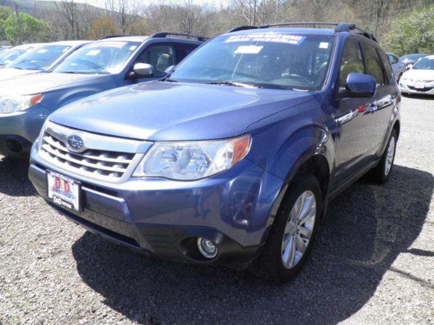 2011 BLUE Subaru Forester 2.5X Limited (JF2SHAEC0BH) with an 2.5 L4 engine, AT transmission, located at 19521 New George's Creek Rd SW, Barton, MD, 21521, (301) 463-2404, 39.524323, -79.017906 - Photo#0