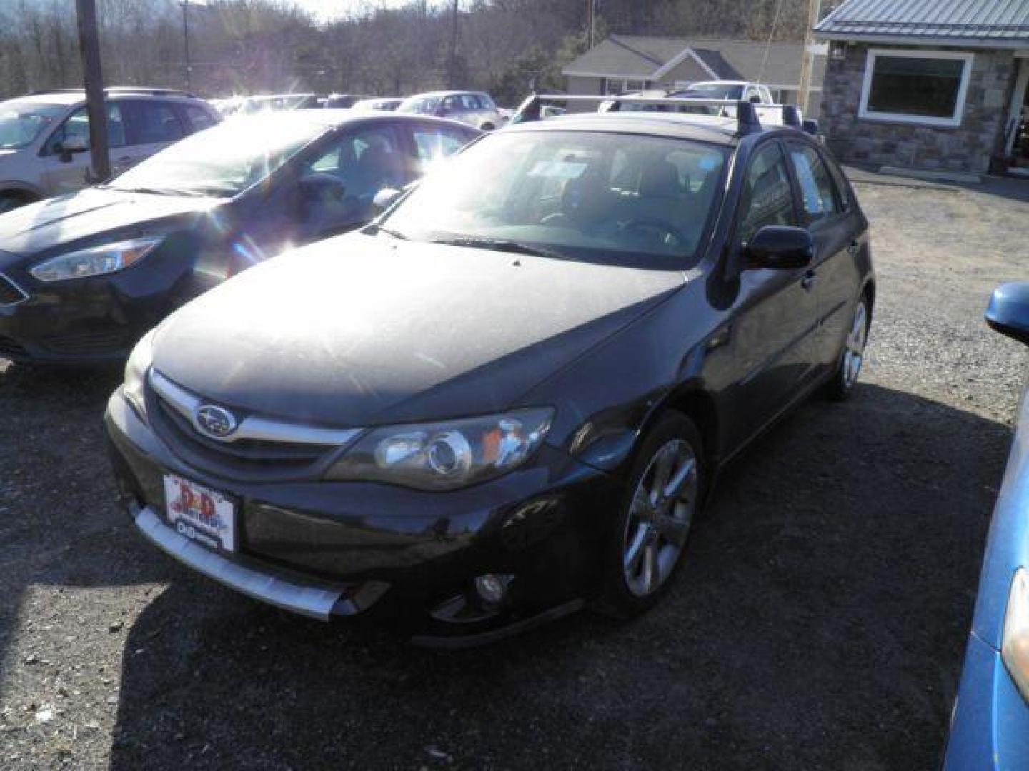 2011 BLACK Subaru Impreza Outback Sport (JF1GH6D66BH) with an 2.5 L4 engine, AT transmission, located at 19521 New George's Creek Rd SW, Barton, MD, 21521, (301) 463-2404, 39.524323, -79.017906 - Photo#0