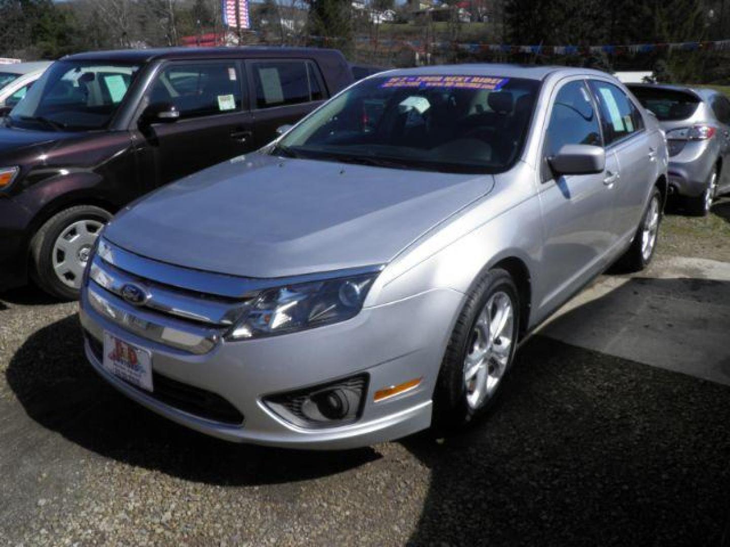 2012 SILVER Ford Fusion SE (3FAHP0HA0CR) with an 2.5L L4 engine, AT transmission, located at 19521 New George's Creek Rd SW, Barton, MD, 21521, (301) 463-2404, 39.524323, -79.017906 - Photo#0