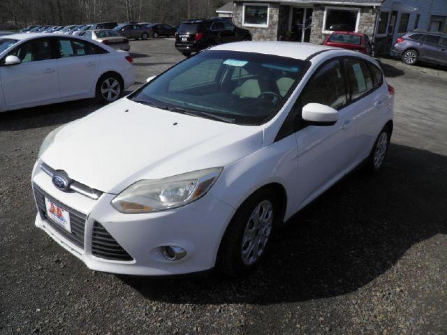 2012 WHITE Ford Focus SE (1FAHP3K23CL) with an 2.0l L4 engine, AT transmission, located at 19521 New George's Creek Rd SW, Barton, MD, 21521, (301) 463-2404, 39.524323, -79.017906 - Photo#0