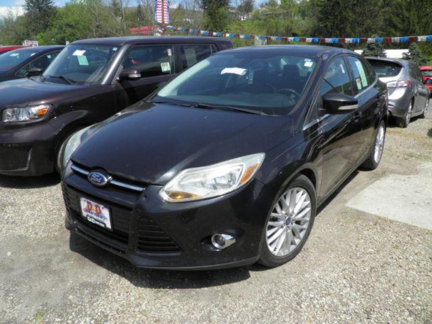 2012 BLACK Ford Focus SEL Sedan (1FAHP3H2XCL) with an 2.0L L4 engine, AT transmission, located at 19521 New George's Creek Rd SW, Barton, MD, 21521, (301) 463-2404, 39.524323, -79.017906 - Photo#0