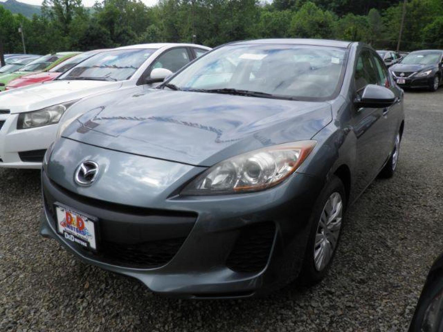 2012 GRAY Mazda MAZDA3 i Sport 4-Door (JM1BL1UG8C1) with an 2.0L L4 engine, 5SP transmission, located at 19521 New George's Creek Rd SW, Barton, MD, 21521, (301) 463-2404, 39.524323, -79.017906 - Photo#0