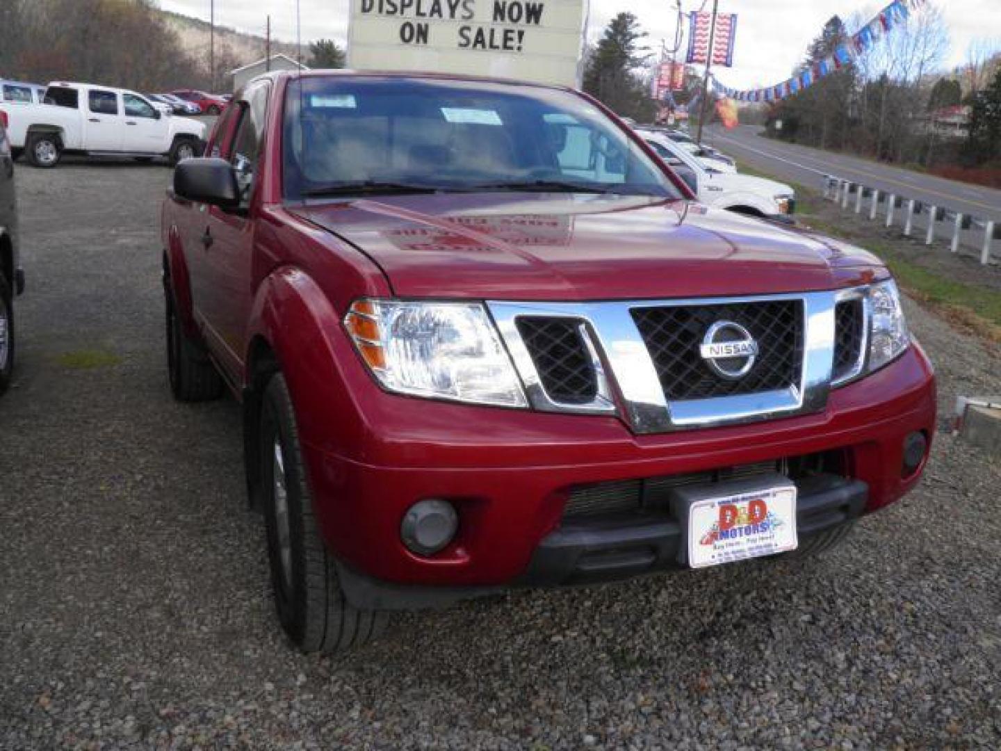 2012 RED Nissan Frontier SV I4 King Cab 2WD (1N6BD0CT6CC) with an 2.5 L4 engine, located at 19521 New George's Creek Rd SW, Barton, MD, 21521, (301) 463-2404, 39.524323, -79.017906 - Photo#0