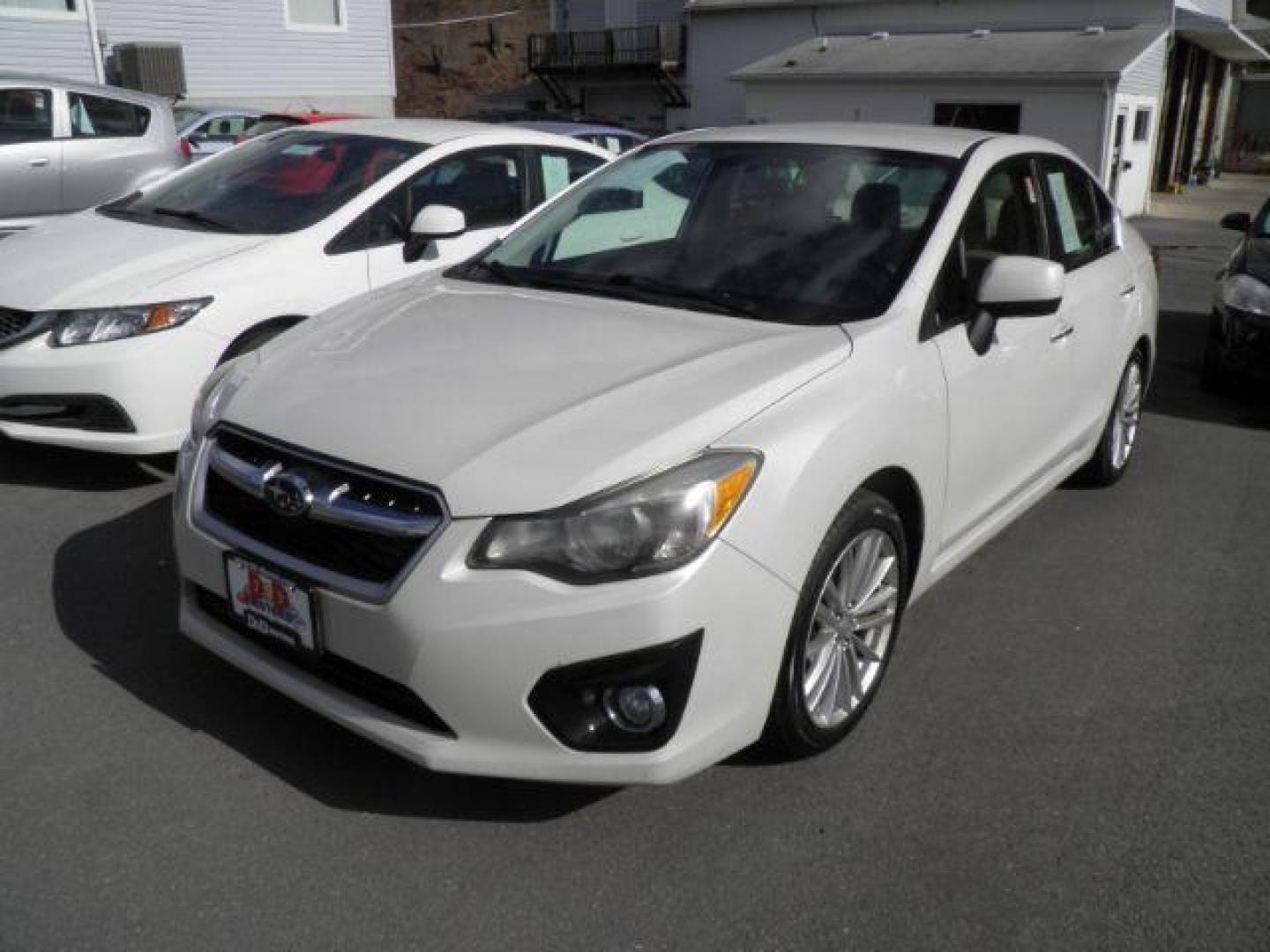 2012 WHITE Subaru Impreza Limited 4-Door (JF1GJAG63CH) with an 2.0L L4 engine, AT transmission, located at 15520 McMullen Hwy SW, Belair, MD, 21502, (301) 729-3700, 39.581375, -78.846451 - Photo#0