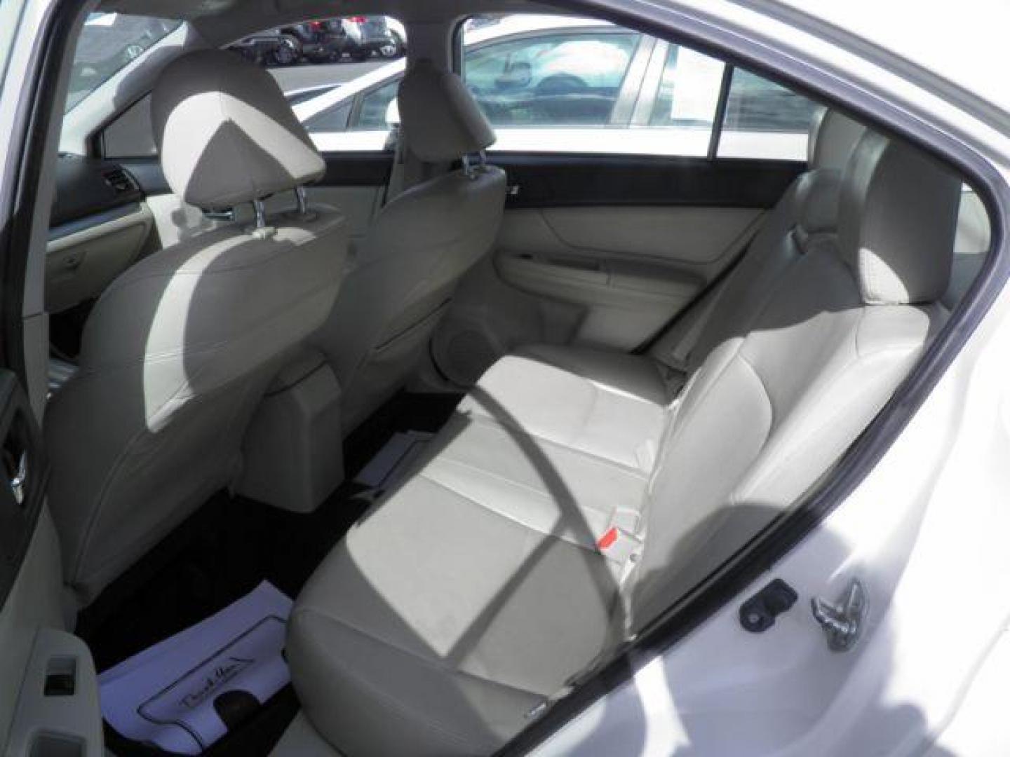 2012 WHITE Subaru Impreza Limited 4-Door (JF1GJAG63CH) with an 2.0L L4 engine, AT transmission, located at 15520 McMullen Hwy SW, Belair, MD, 21502, (301) 729-3700, 39.581375, -78.846451 - Photo#3