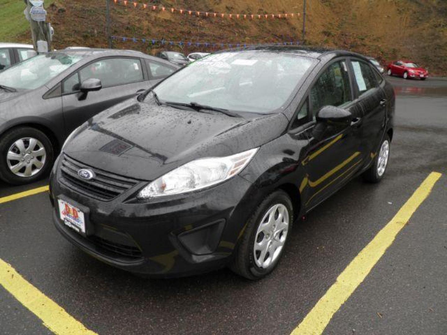 2013 BLACK FORD FIESTA S Sedan (3FADP4AJ2DM) with an 1.6l L4 engine, AT transmission, located at 15520 McMullen Hwy SW, Belair, MD, 21502, (301) 729-3700, 39.581375, -78.846451 - Photo#0