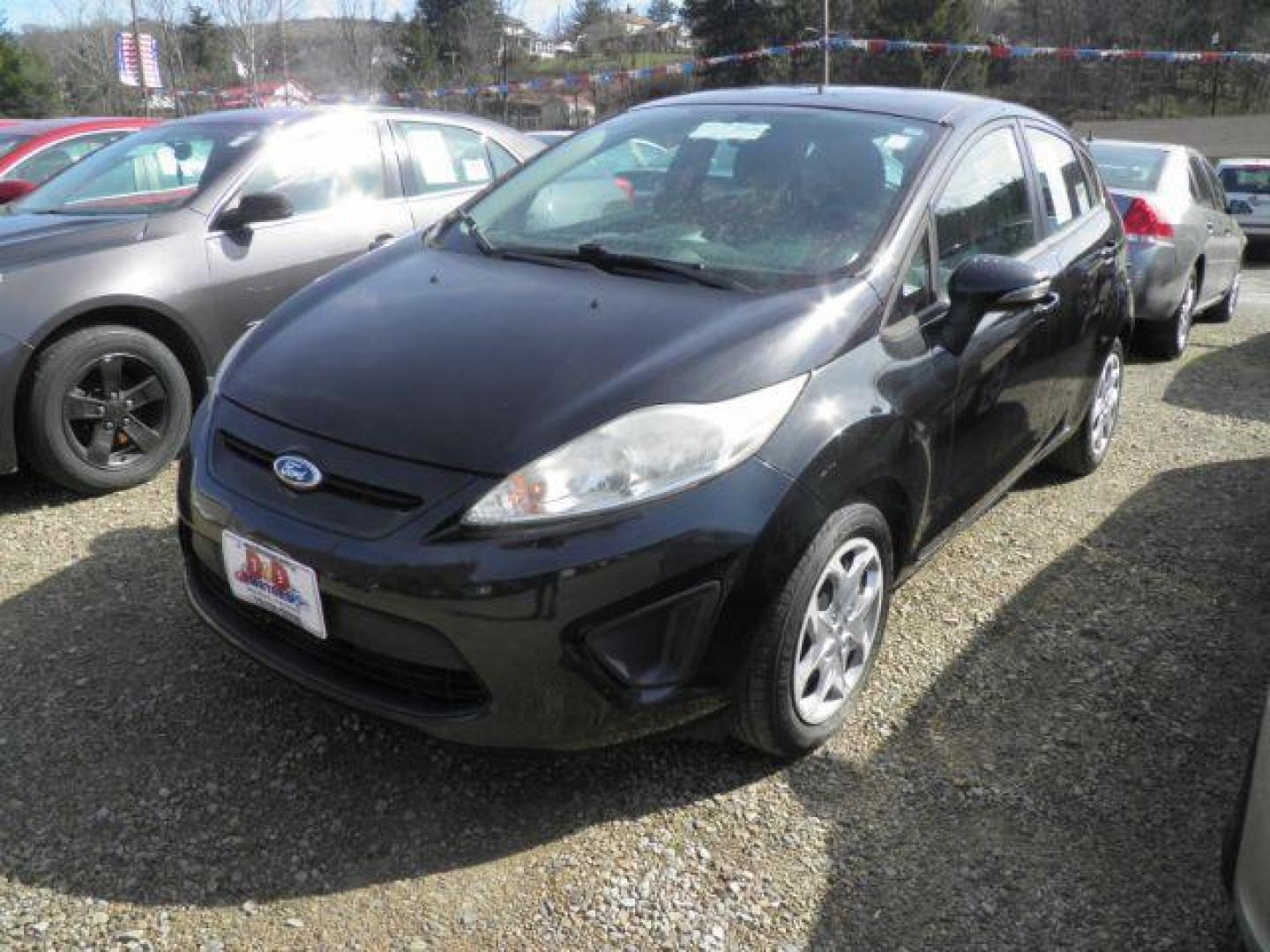 2013 BLACK Ford Fiesta SE Hatchback (3FADP4EJXDM) with an 1.6L L4 engine, located at 19521 New George's Creek Rd SW, Barton, MD, 21521, (301) 463-2404, 39.524323, -79.017906 - Photo#0