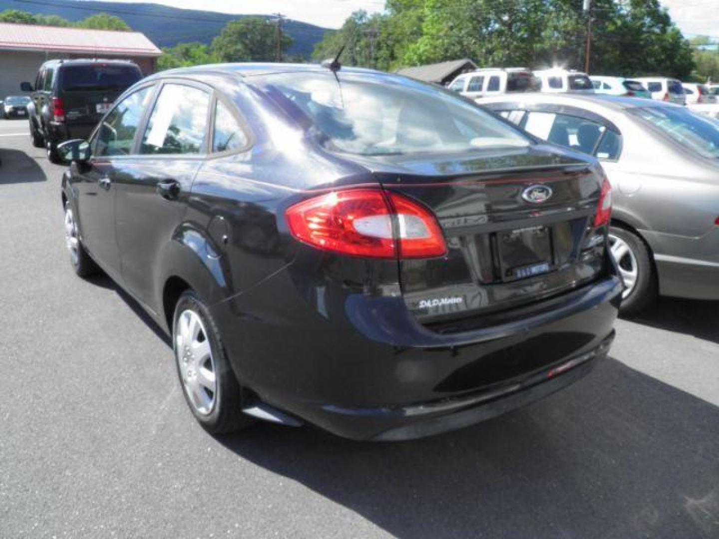 2013 BLACK Ford Fiesta S Sedan (3FADP4AJ2DM) with an 1.6L L4 DOHC 16V engine, 5SP transmission, located at 19521 New George's Creek Rd SW, Barton, MD, 21521, (301) 463-2404, 39.524323, -79.017906 - Photo#3