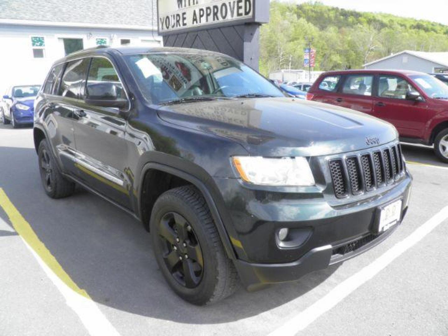 2013 BLACK Jeep Grand Cherokee Laredo 4WD (1C4RJFAG7DC) with an 3.6L V6 engine, AT transmission, located at 15520 McMullen Hwy SW, Belair, MD, 21502, (301) 729-3700, 39.581375, -78.846451 - Photo#0