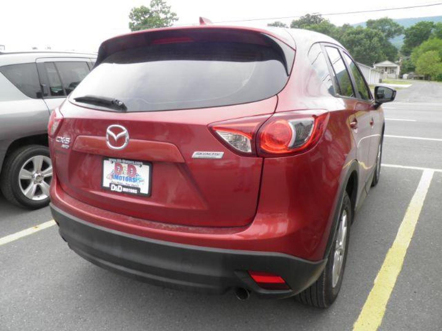 2013 RED Mazda CX-5 Sport AWD (JM3KE4BE5D0) with an 2.0L L4 engine, AT transmission, located at 19521 New George's Creek Rd SW, Barton, MD, 21521, (301) 463-2404, 39.524323, -79.017906 - Photo#5