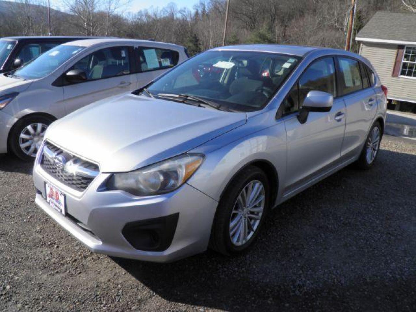 2013 SILVER Subaru Impreza Premium Plus 5-Door+ (JF1GPAD6XD2) with an 2.0L H4 DOHC 16V engine, AT transmission, located at 19521 New George's Creek Rd SW, Barton, MD, 21521, (301) 463-2404, 39.524323, -79.017906 - Photo#0