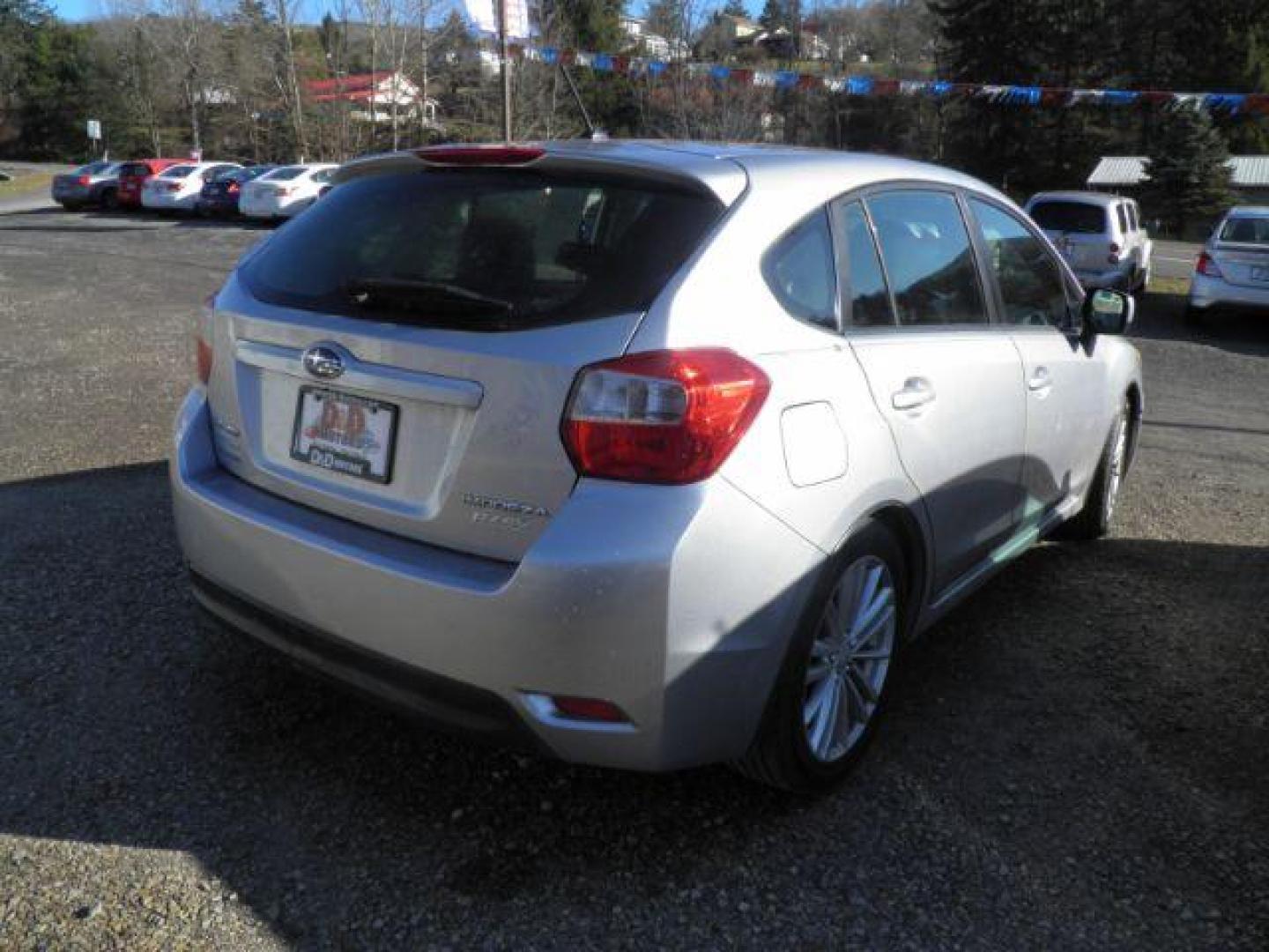 2013 SILVER Subaru Impreza Premium Plus 5-Door+ (JF1GPAD6XD2) with an 2.0L H4 DOHC 16V engine, AT transmission, located at 19521 New George's Creek Rd SW, Barton, MD, 21521, (301) 463-2404, 39.524323, -79.017906 - Photo#4