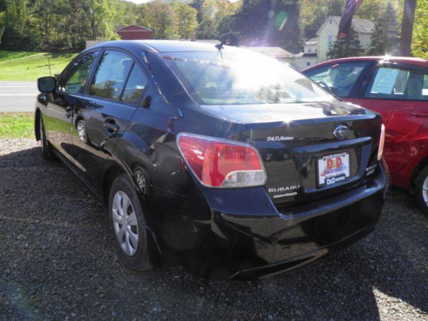 2013 BLACK SUBARU IMPREZA Base 4-Door (JF1GJAA62DH) with an 2.0L L4 engine, AT transmission, located at 15520 McMullen Hwy SW, Belair, MD, 21502, (301) 729-3700, 39.581375, -78.846451 - Photo#4