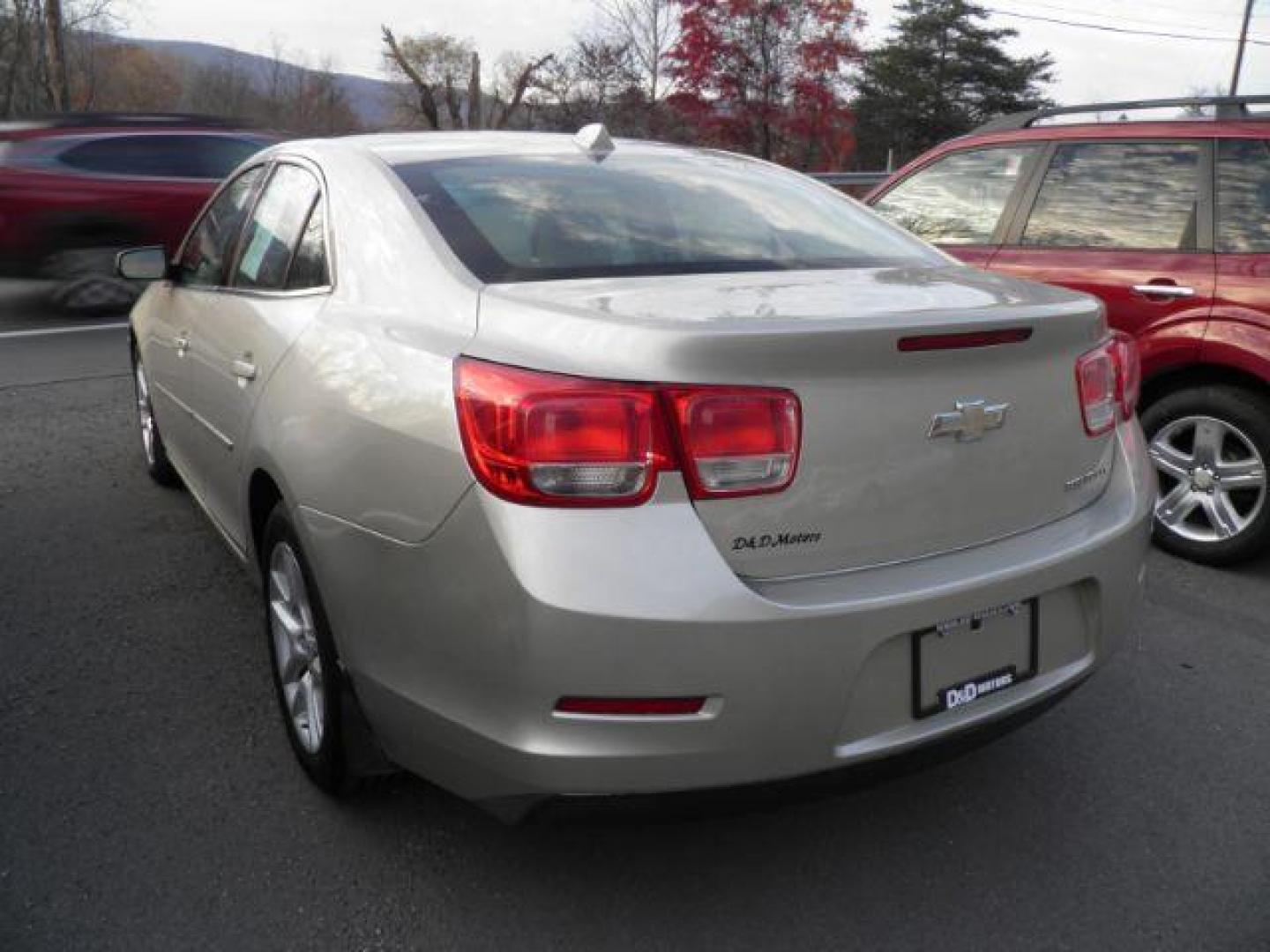 2014 TAN Chevrolet Malibu 1LT (1G11C5SL9EF) with an 2.5 L4 engine, AT transmission, located at 15520 McMullen Hwy SW, Belair, MD, 21502, (301) 729-3700, 39.581375, -78.846451 - Photo#4