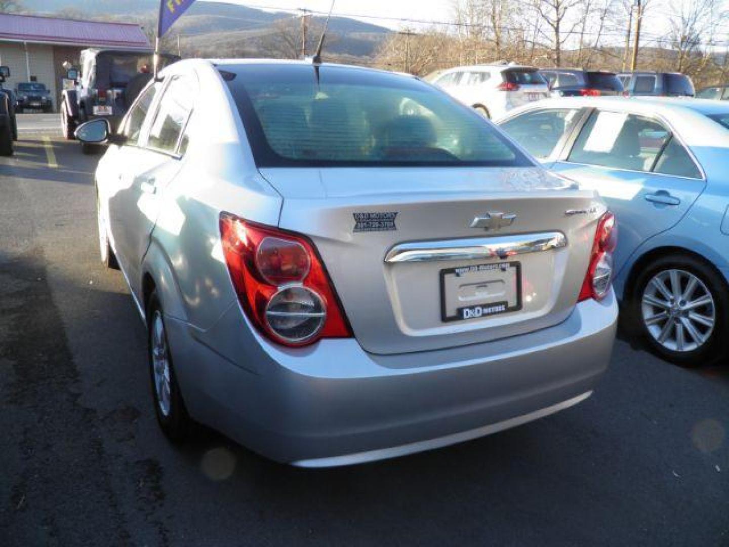 2014 SILVER Chevrolet SONIC LT Auto Sedan (1G1JC5SH2E4) with an 1.8L L4 engine, AT transmission, located at 15520 McMullen Hwy SW, Belair, MD, 21502, (301) 729-3700, 39.581375, -78.846451 - Photo#4