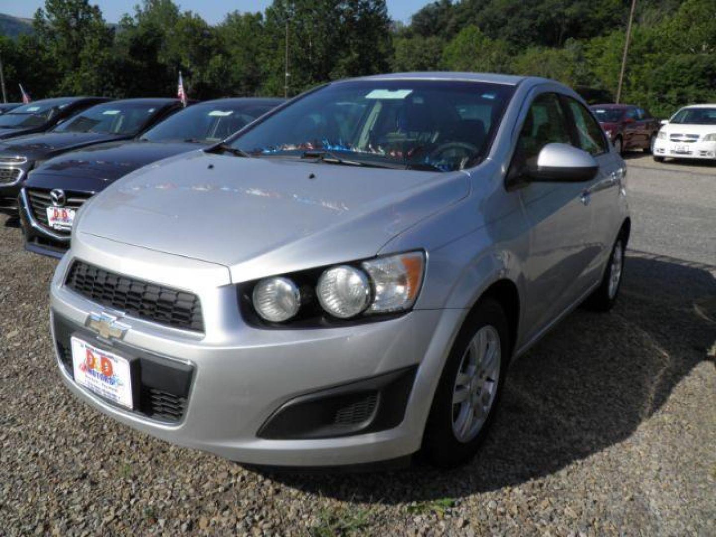 2014 SILVER Chevrolet Sonic LT Auto Sedan (1G1JC5SH3E4) with an 1.8L L4 engine, AT transmission, located at 19521 New George's Creek Rd SW, Barton, MD, 21521, (301) 463-2404, 39.524323, -79.017906 - Photo#0