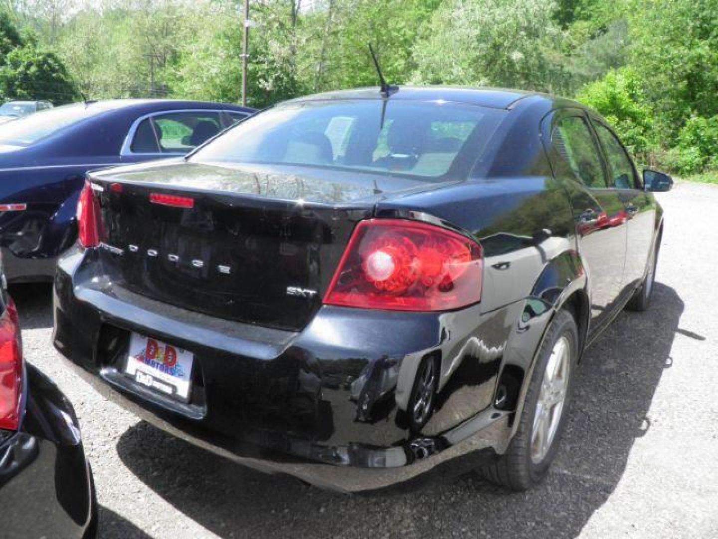 2014 BLACK Dodge Avenger SXT (1C3CDZCBXEN) with an 2.4l L4 engine, AT transmission, located at 19521 New George's Creek Rd SW, Barton, MD, 21521, (301) 463-2404, 39.524323, -79.017906 - Photo#4