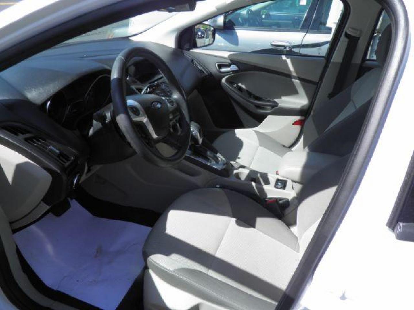 2014 WHITE Ford Focus SE Sedan (1FADP3F26EL) with an 2.0L L4 engine, located at 15520 McMullen Hwy SW, Belair, MD, 21502, (301) 729-3700, 39.581375, -78.846451 - Photo#1