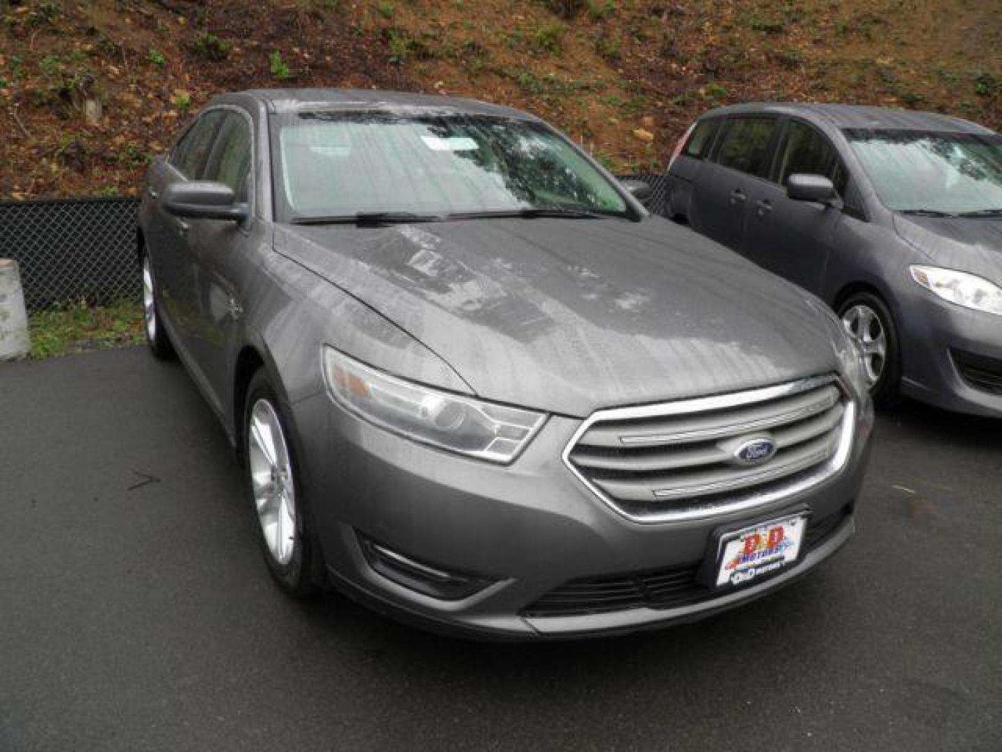 2014 GRAY FORD TAURUS SEL AWD (1FAHP2H82EG) with an 3.5L V6 engine, AT transmission, located at 15520 McMullen Hwy SW, Belair, MD, 21502, (301) 729-3700, 39.581375, -78.846451 - Photo#0