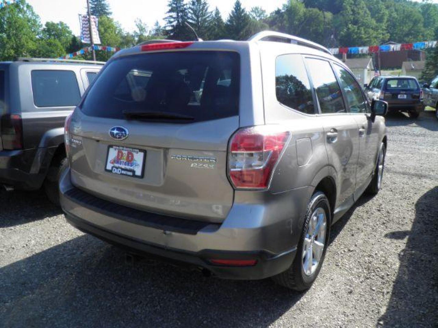 2014 BRONZE Subaru Forester 2.5i Premium (JF2SJACC3EG) with an 2.5 L4 engine, 6SP transmission, located at 19521 New George's Creek Rd SW, Barton, MD, 21521, (301) 463-2404, 39.524323, -79.017906 - Photo#5