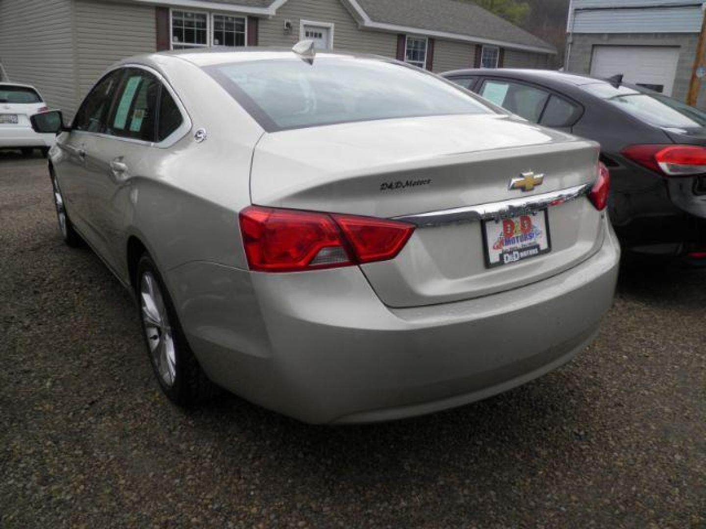 2015 GOLD Chevrolet Impala 1LT (2G1115SL0F9) with an 2.5 L4 engine, AT transmission, located at 19521 New George's Creek Rd SW, Barton, MD, 21521, (301) 463-2404, 39.524323, -79.017906 - Photo#4