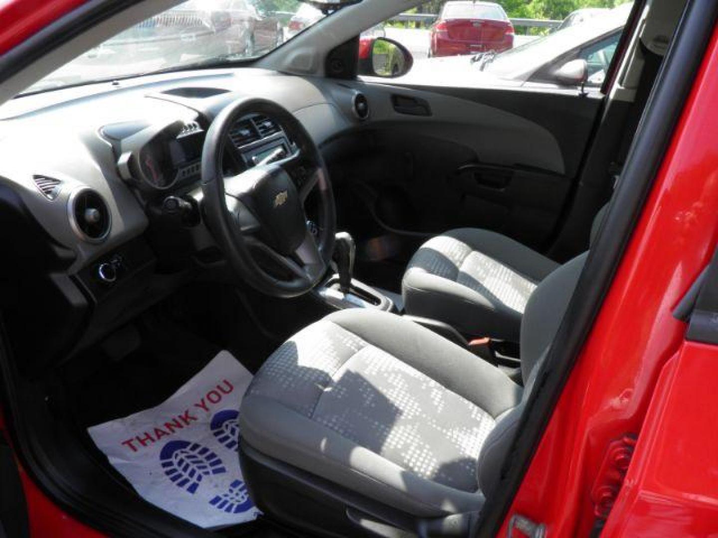 2015 RED Chevrolet Sonic LS Auto 5-Door (1G1JA6SG8F4) with an 1.8l L4 engine, AT transmission, located at 19521 New George's Creek Rd SW, Barton, MD, 21521, (301) 463-2404, 39.524323, -79.017906 - Photo#1