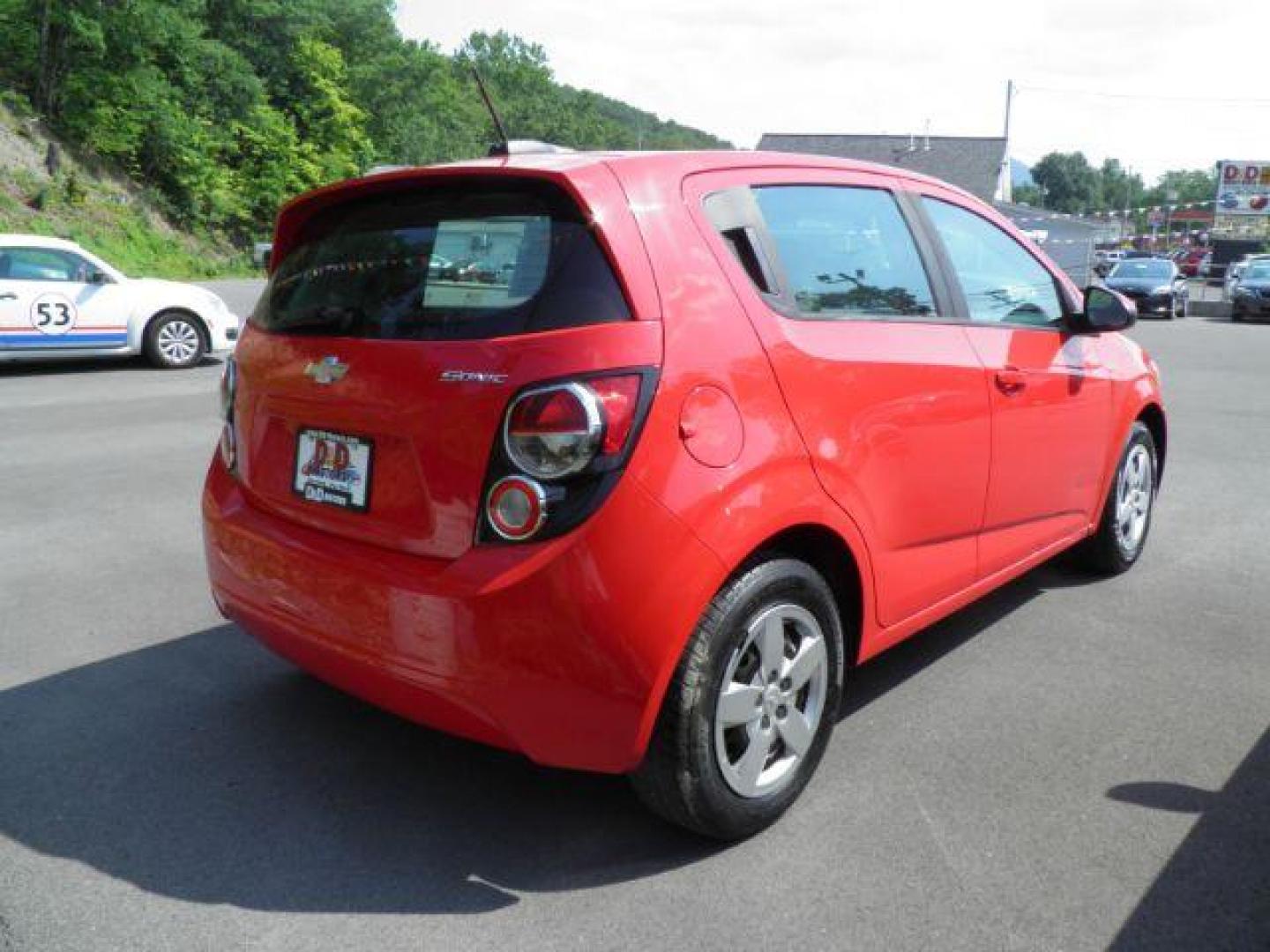 2015 RED Chevrolet Sonic LS Auto 5-Door (1G1JA6SG8F4) with an 1.8l L4 engine, AT transmission, located at 19521 New George's Creek Rd SW, Barton, MD, 21521, (301) 463-2404, 39.524323, -79.017906 - Photo#4