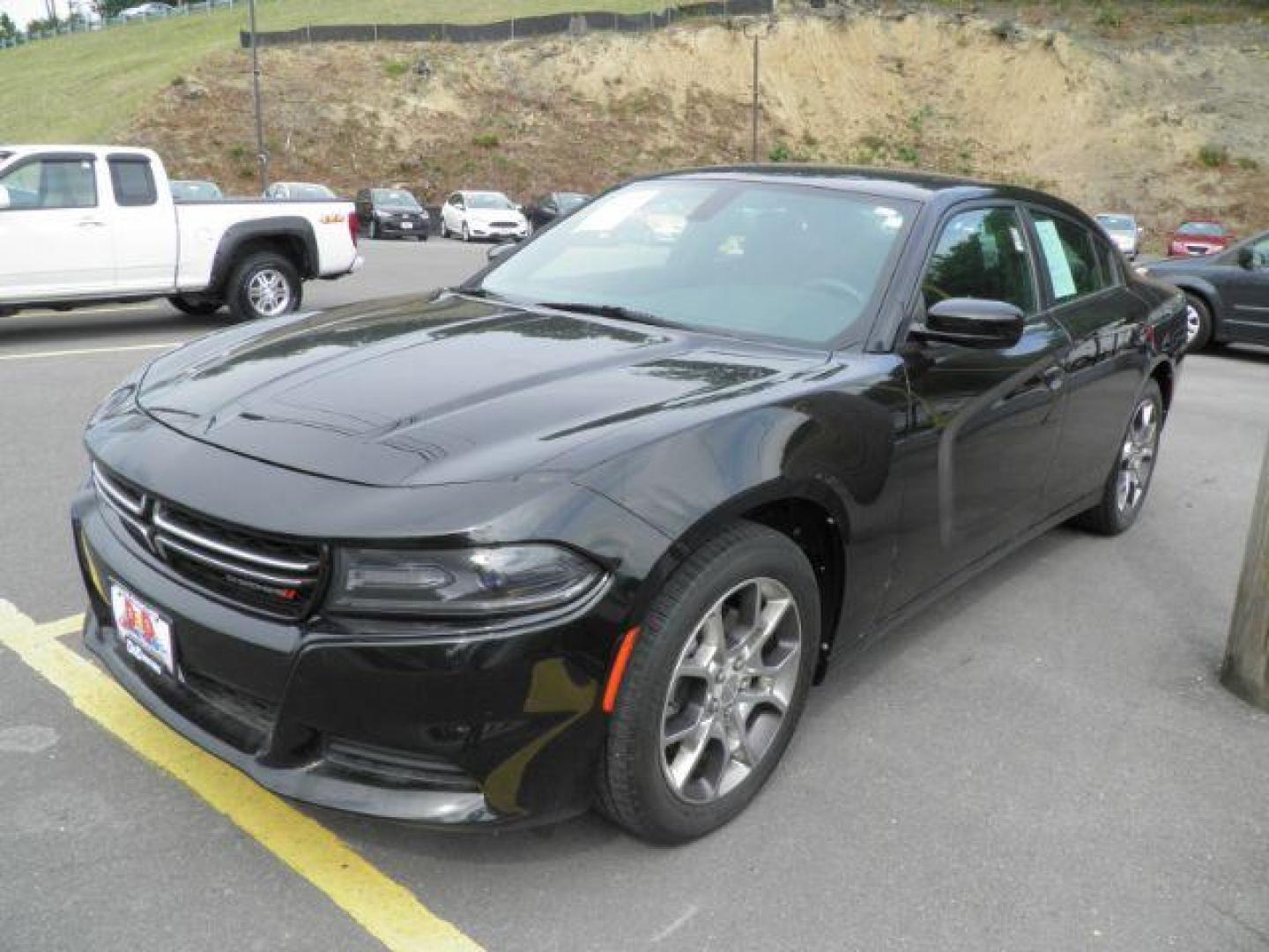 2015 BLACK Dodge Charger SE (2C3CDXFGXFH) with an 3.6L V6 engine, AT transmission, located at 15520 McMullen Hwy SW, Belair, MD, 21502, (301) 729-3700, 39.581375, -78.846451 - Photo#0