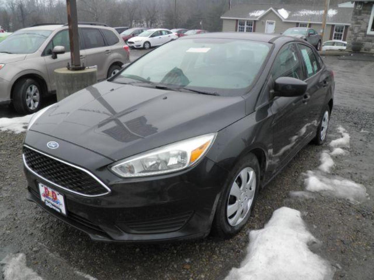 2015 BLACK Ford Focus S Sedan (1FADP3E26FL) with an 2.0l L4 engine, AT transmission, located at 19521 New George's Creek Rd SW, Barton, MD, 21521, (301) 463-2404, 39.524323, -79.017906 - Photo#0