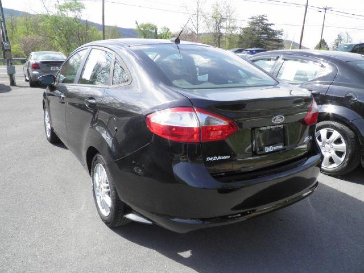 2015 BLACK Ford Fiesta S Sedan (3FADP4AJ5FM) with an 1.6L L4 engine, AT transmission, located at 19521 New George's Creek Rd SW, Barton, MD, 21521, (301) 463-2404, 39.524323, -79.017906 - Photo#4