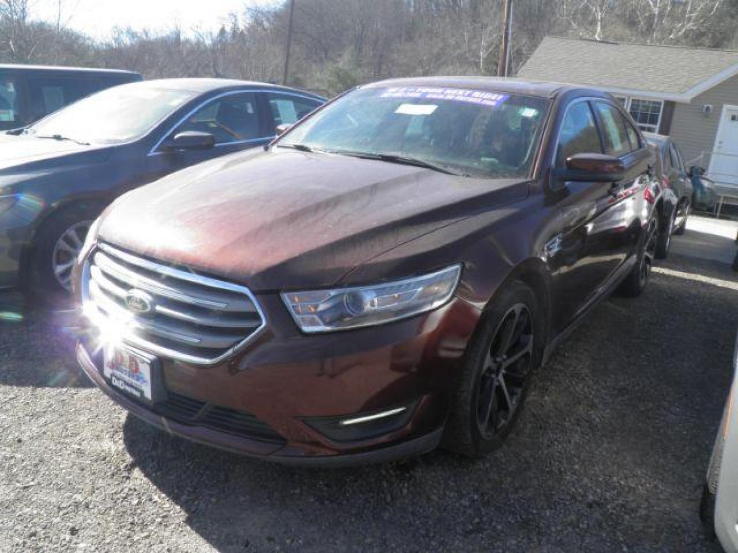 2015 BROWN Ford Taurus SEL FWD (1FAHP2E86FG) with an 3.5L V6 engine, AT transmission, located at 19521 New George's Creek Rd SW, Barton, MD, 21521, (301) 463-2404, 39.524323, -79.017906 - Photo#0