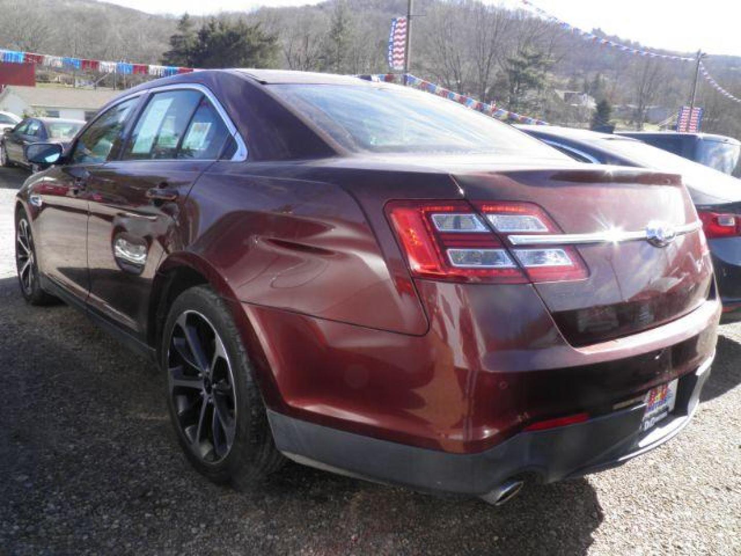 2015 BROWN Ford Taurus SEL FWD (1FAHP2E86FG) with an 3.5L V6 engine, AT transmission, located at 19521 New George's Creek Rd SW, Barton, MD, 21521, (301) 463-2404, 39.524323, -79.017906 - Photo#4