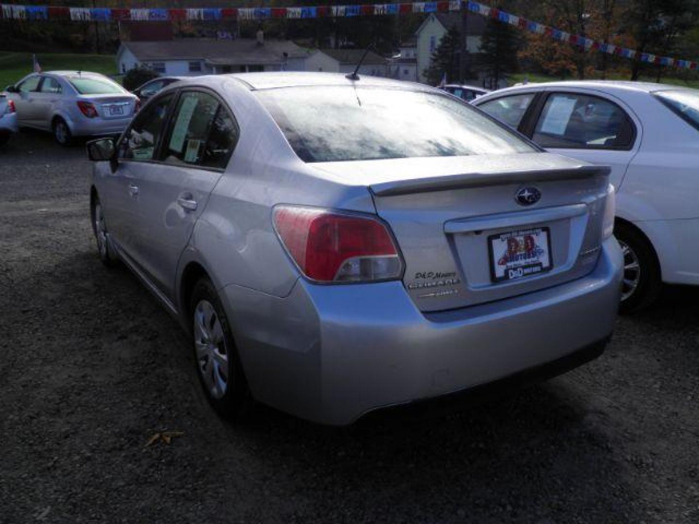 2015 SILVER Subaru Impreza 2.0i PZEV CVT 4-Door (JF1GJAA66FH) with an 2.0l L4 engine, CVT transmission, located at 19521 New George's Creek Rd SW, Barton, MD, 21521, (301) 463-2404, 39.524323, -79.017906 - Photo#4