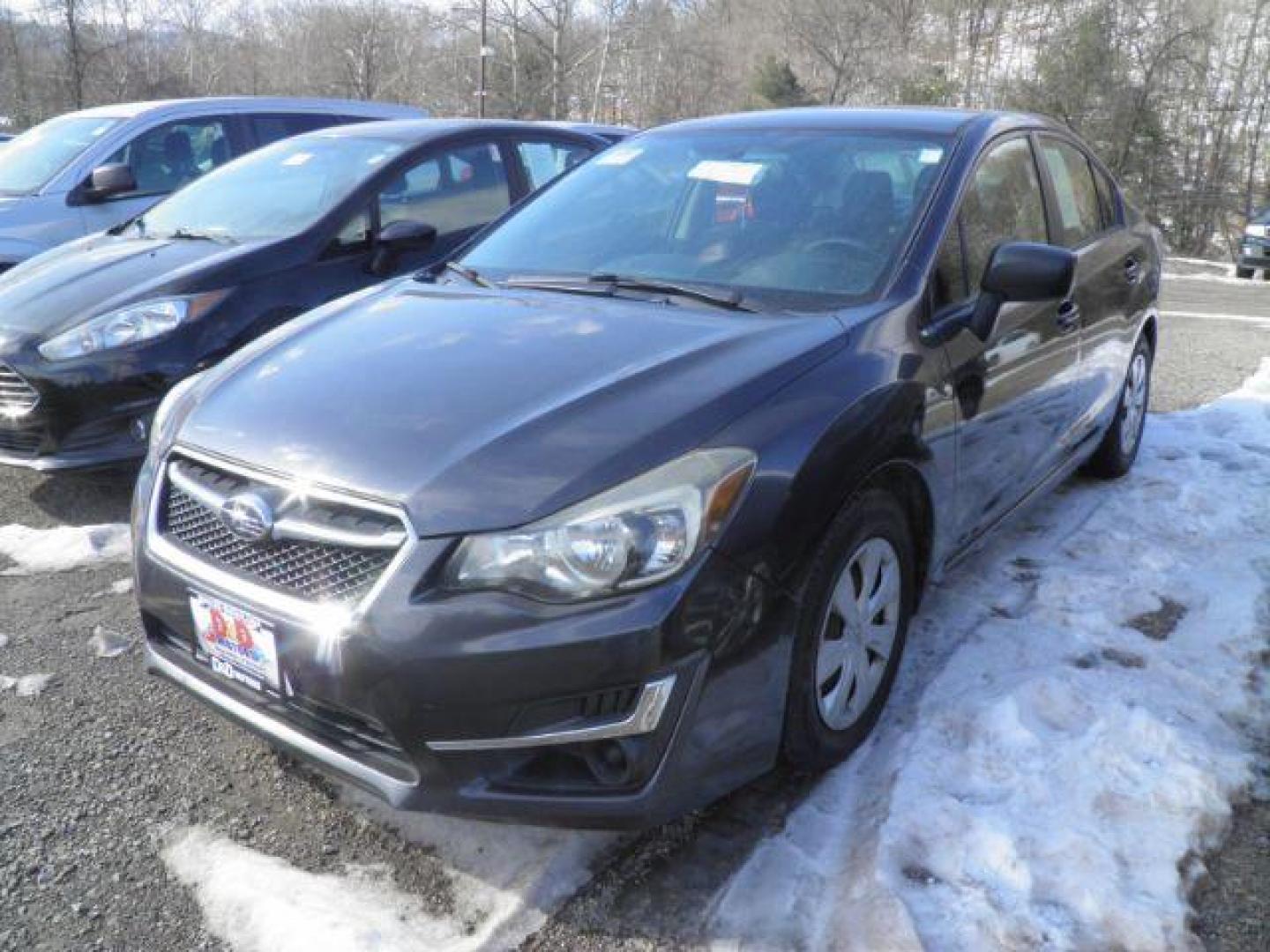 2015 GRAY Subaru Impreza 2.0i PZEV CVT 4-Door (JF1GJAA68FH) with an 2.0L L4 engine, CVT transmission, located at 15520 McMullen Hwy SW, Belair, MD, 21502, (301) 729-3700, 39.581375, -78.846451 - Photo#0