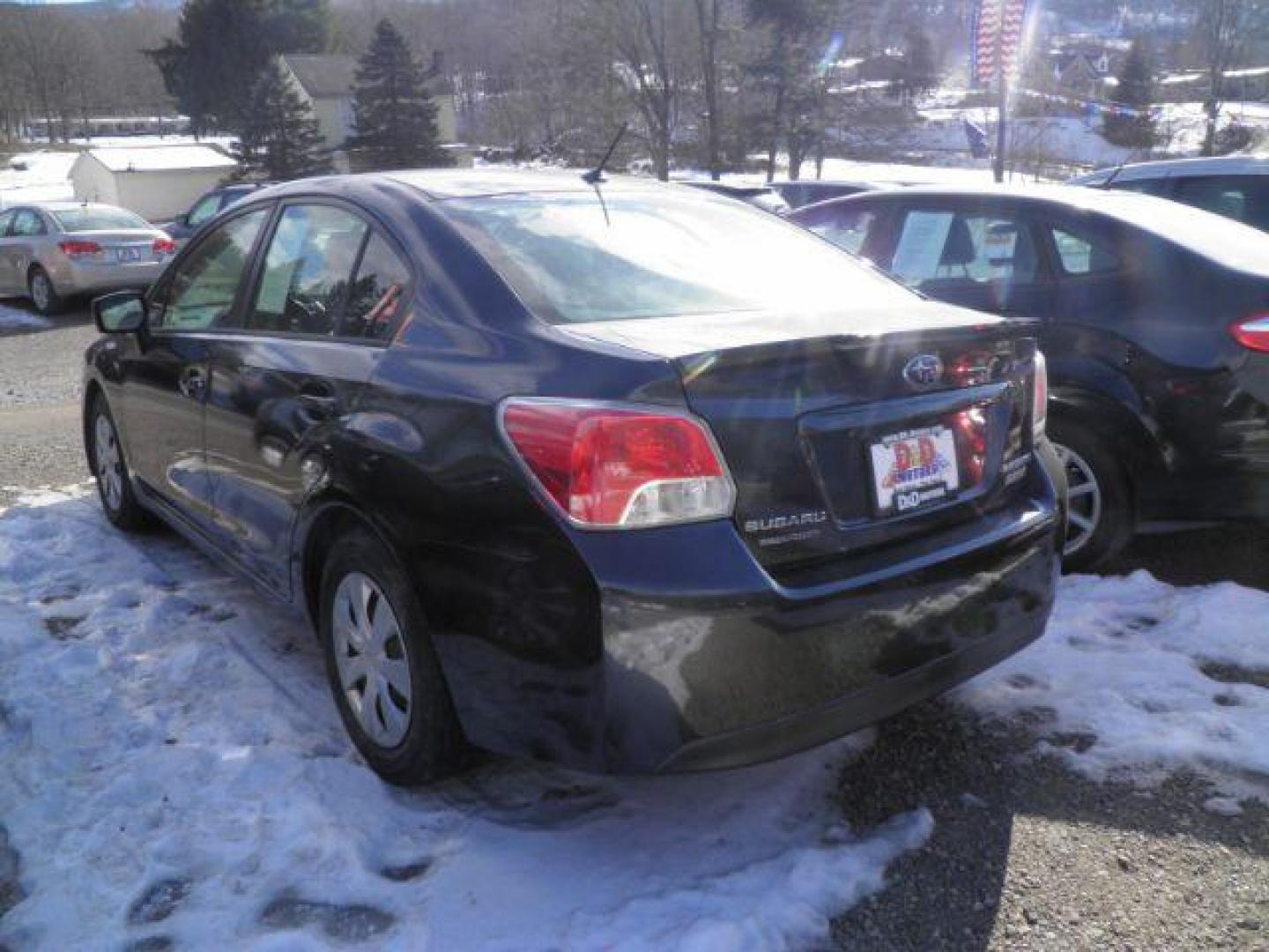 2015 GRAY Subaru Impreza 2.0i PZEV CVT 4-Door (JF1GJAA68FH) with an 2.0L L4 engine, CVT transmission, located at 15520 McMullen Hwy SW, Belair, MD, 21502, (301) 729-3700, 39.581375, -78.846451 - Photo#4