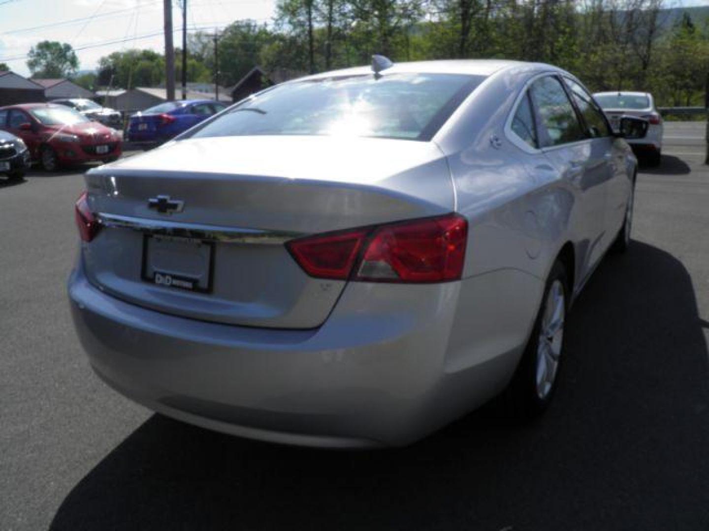 2016 SILVER Chevrolet Impala LT (2G1115S30G9) with an 3.6L V6 engine, AT transmission, located at 19521 New George's Creek Rd SW, Barton, MD, 21521, (301) 463-2404, 39.524323, -79.017906 - Photo#4